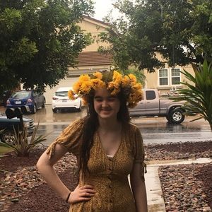 flower crown- small, densely packed yellow flowers